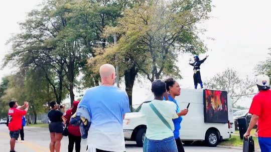 A crowd gathered around the Haul Adz LED truck at the Jackson Block Party
